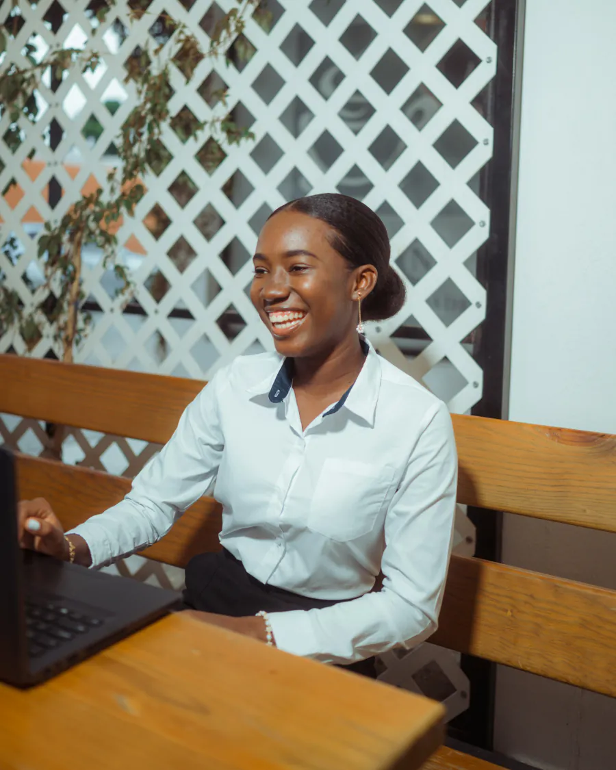 Young woman searching for jobs on her laptop